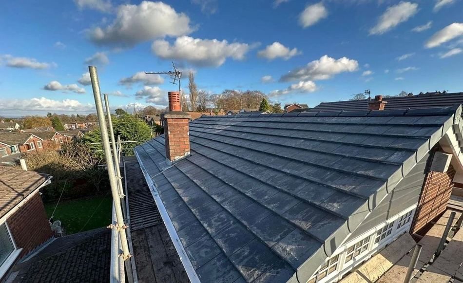 Full re-roof in grey tile